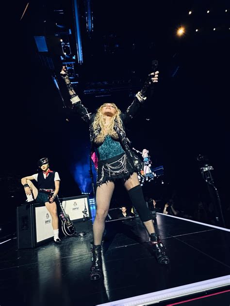 madonna falls on stage at concert after dancer drops her